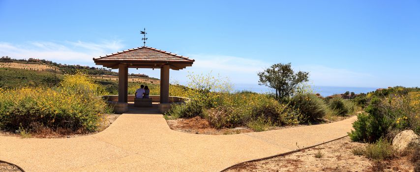 Gazebo over Newport Coast hiking trail near Crystal Cove, California in spring