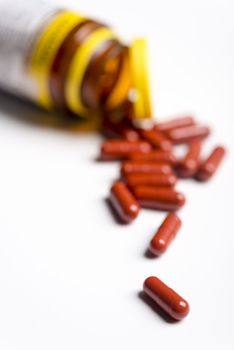 Pills and medicine over a white board