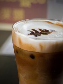 COLOR PHOTO OF ICED CAPPUCCINO WITH LATTE ART