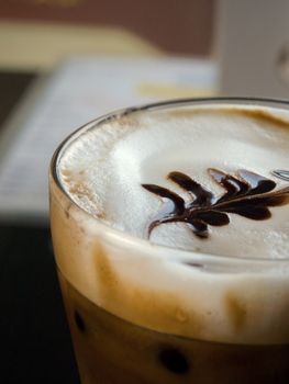 COLOR PHOTO OF ICED CAPPUCCINO WITH LATTE ART