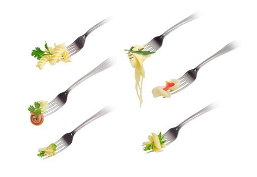 Set of images of the various cooked pasta on the stainless steel fork on a light background
