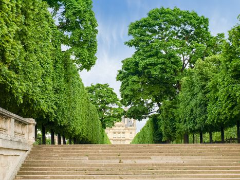 Terrace embankment of the River Seine beside to the Tuileries Garden with stairs on the foreground in Paris in the springtime
