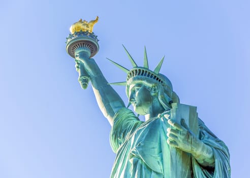 the statue of liberty on a sunny day