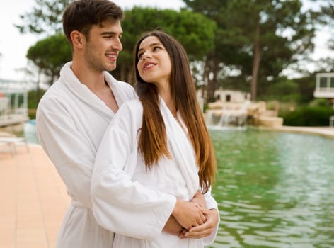 Young couple enjoying vacations in a hotel