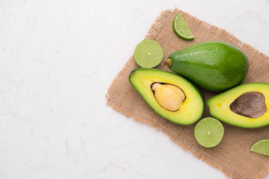 Healthy food concept. Fresh organic avocado on table