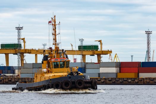 Tug ship in the cargo port of Riga, Europe