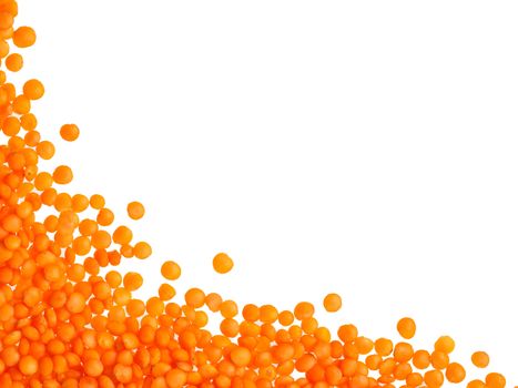 Red orange lentil Football type with copy space. Isolated one edge. Top view or flat lay