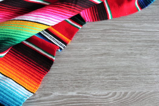 poncho serape background Mexican cinco de mayo fiesta wooden copy space