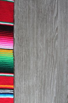 poncho serape background Mexican cinco de mayo fiesta wooden copy space