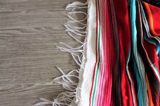 poncho serape background Mexican cinco de mayo fiesta wooden copy space