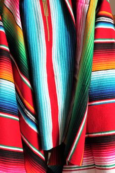 poncho serape background Mexican cinco de mayo fiesta wooden copy space