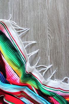 poncho serape background Mexican cinco de mayo fiesta wooden copy space