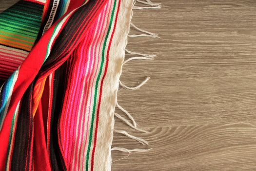 poncho serape background Mexican cinco de mayo fiesta wooden copy space