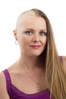 Portrait of beautiful middle age woman patient with cancer with half shaved head hair isolated on white background, hope in healing. She lost her hair