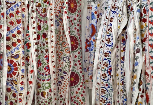 Traditional uzbek suzani embroidery fabrics at oriental bazaar, Bukhara, Uzbekistan