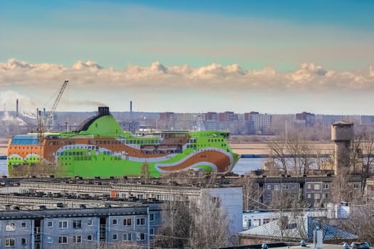 Green cruise liner. Passenger ferry sailing past the Riga city