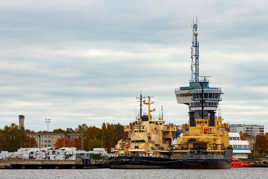 Yellow icebreakers moored at the port of Riga, Europe