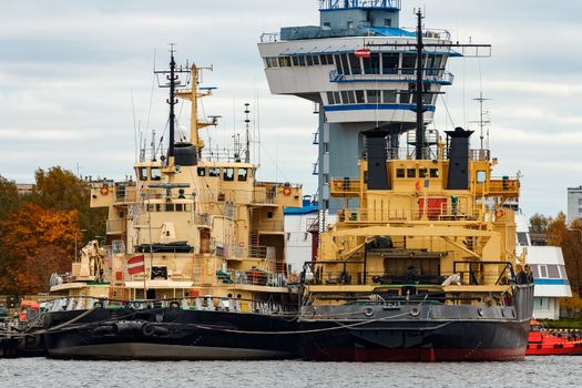 Yellow icebreakers moored at the port of Riga, Europe