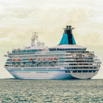 Cruise liner entering Baltic sea. White passenger ship