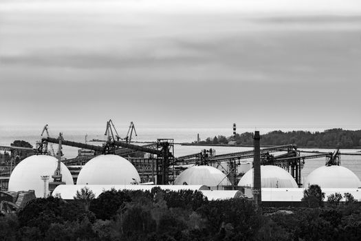 Fuel terminal in Riga, Latvia. Large oil tanks. Monochrome