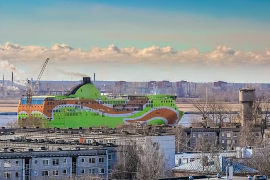 Green cruise liner. Passenger ferry sailing past the Riga city