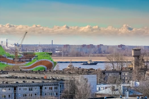 Green cruise liner. Passenger ferry sailing past the Riga city