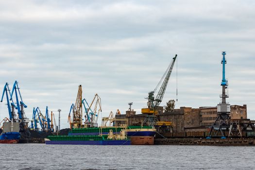 Blue cargo ship in the port of Riga, Europe