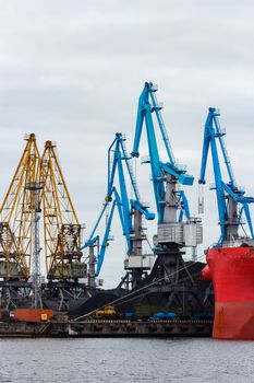 Blue cargo cranes in the port of Riga, Europe