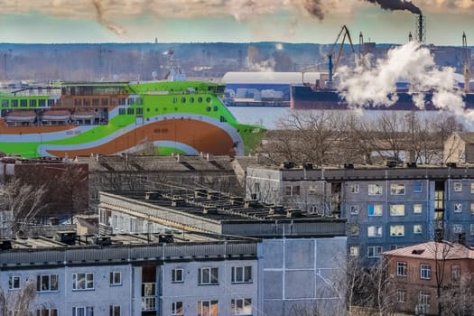 Green cruise liner. Passenger ferry sailing past the Riga city