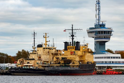 Yellow icebreakers moored at the port of Riga, Europe