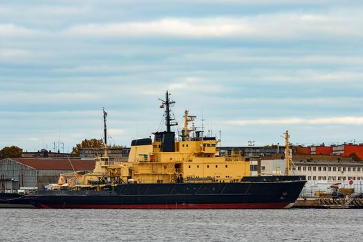 Yellow icebreakers moored at the port of Riga, Europe