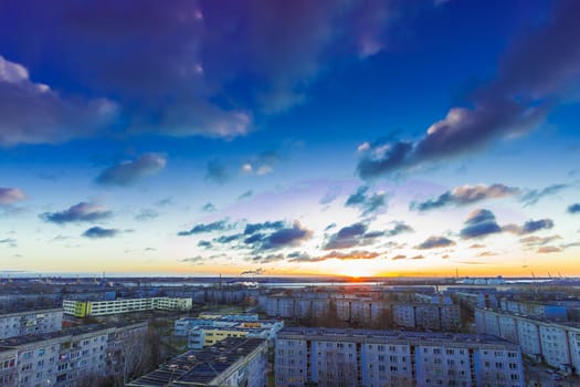 Evening cloudy sky and sunset in district of Riga, Latvia