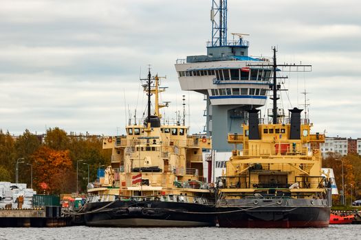 Yellow icebreakers moored at the port of Riga, Europe