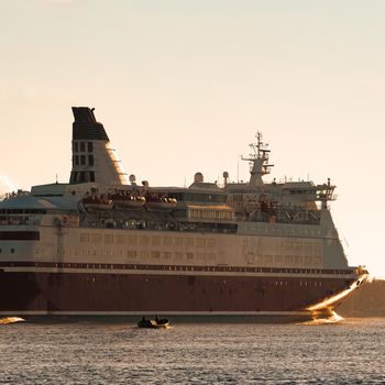 Big cruise liner. Passenger ferry ship entering Riga at morning