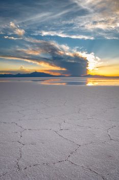 Sunset in Salar de Uyuni salt flats desert, Andes Altiplano, Bolivia