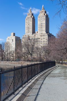 New York City - Panoramic view of modern buildings of upper west side Manhattan from Central Park with Jacqueline Kennedy Onassis Reservoir.