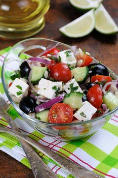 greek salad orzo pasta with black olive, red onion and cucumber, cherry tomatoes, feta and herbs