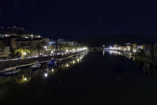 Night on Temo, river crossing the city of Bosa. Sardinia, Northwest Coast.