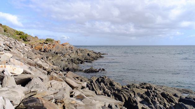 Rock and waves on the sea at sunny day in Kangaroo Island, South Australia.