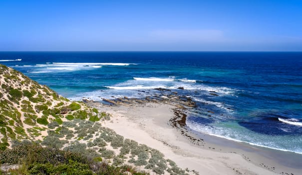 Beautiful beach with blue sea under clear sky at the sunny day in summer