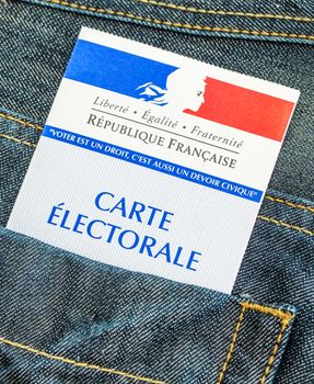 French electoral card in the rear pocket of a jeans, 2017 presidential and legislative elections concept