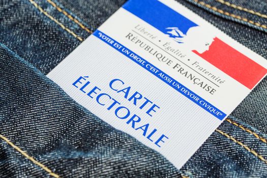 French electoral card in the rear pocket of a jeans, 2017 presidential and legislative elections concept