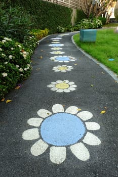 Flower Drawing on Path Way in Public Park.