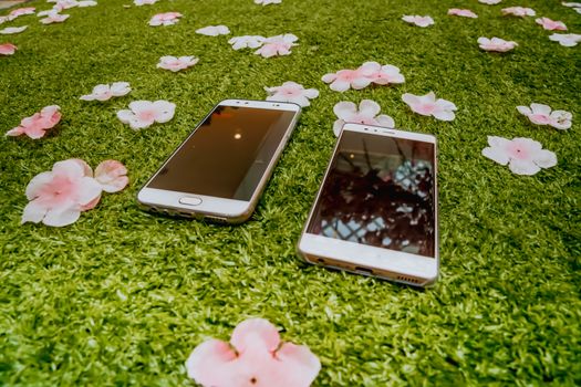 Couple smartphone on the ground