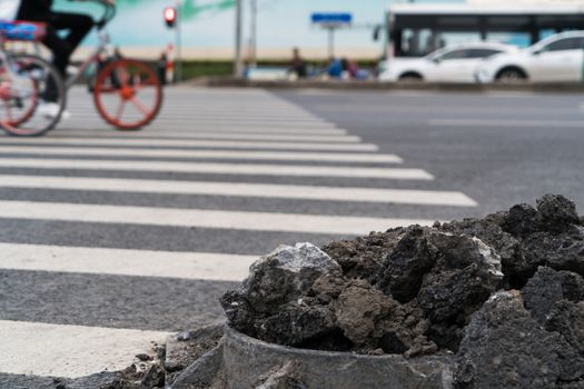 SHANGHAI, CHINA - APRIL, 2017:  No warning sign for obstruction on cross road in blurred background