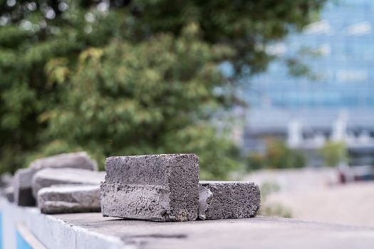 Broken brick on the wall - blurred background