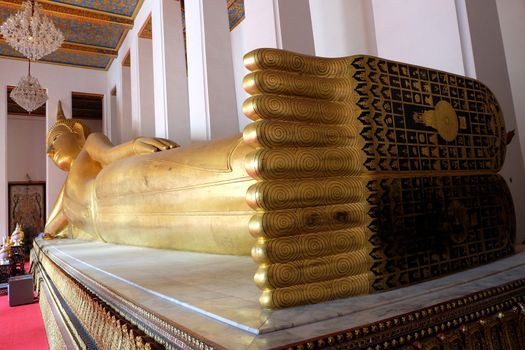 Reclining Buddha Statue, Wat Ratchaorot, Bangkok Thailand.