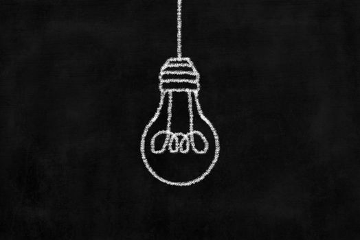 Chalkboard with Chalk Drawing of Hanging Light Bulb.