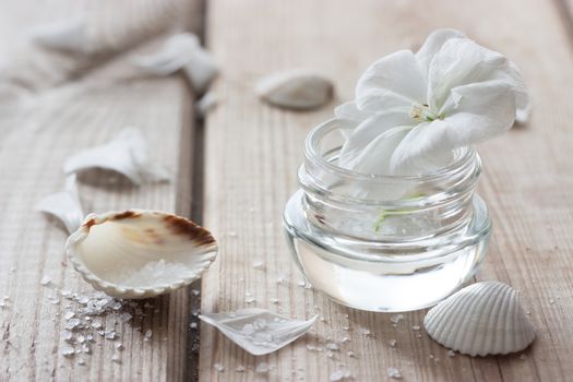 moisturising lotions and white flower, spa treatments