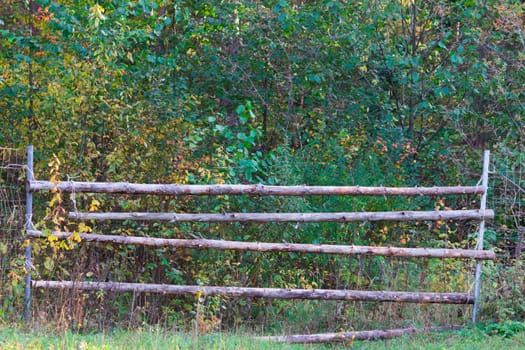 wooden fence in a park or a farm